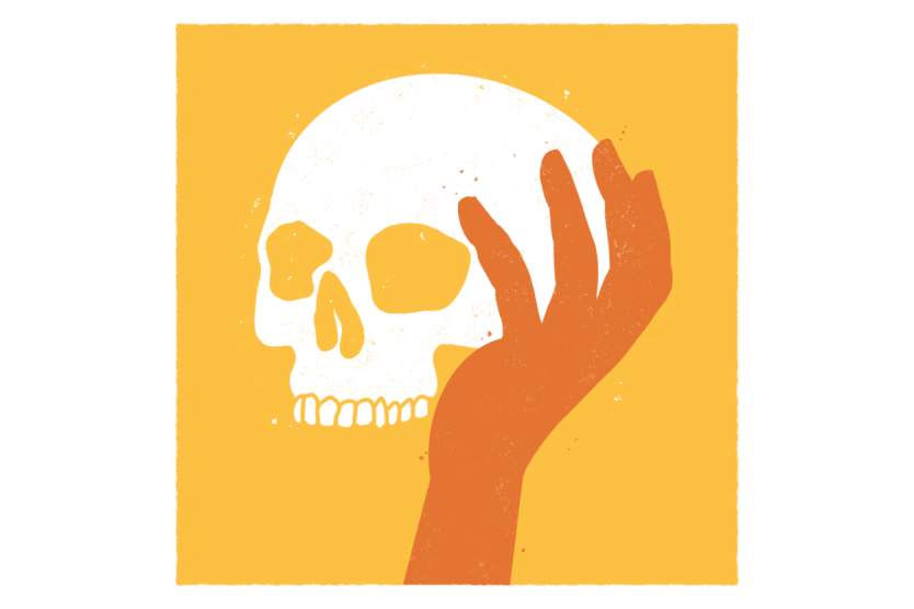Hand holding skull, representing a famous scene from Shakespeare's play Hamlet